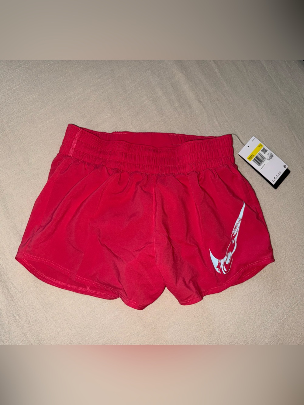 Nike Women’s Hot Pink Athletic Shorts with White Swoosh